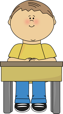 Boy Sitting at School Desk